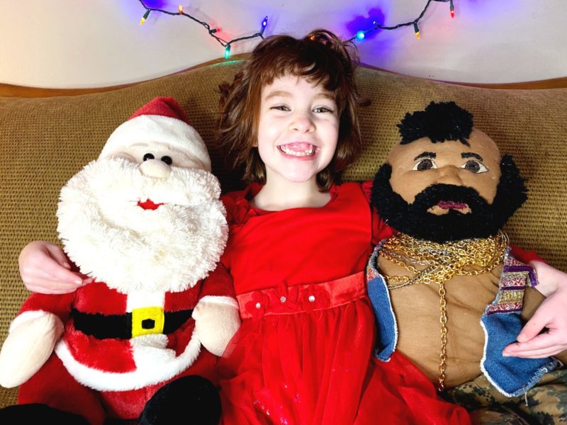 Five year old with Santa and Mr. T