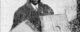 Photograph of Washington Phillips holding two zithers. (Photo via Wikicommons https://en.wikipedia.org/wiki/Washington_Phillips#/media/File:Washington_Phillips.jpg)