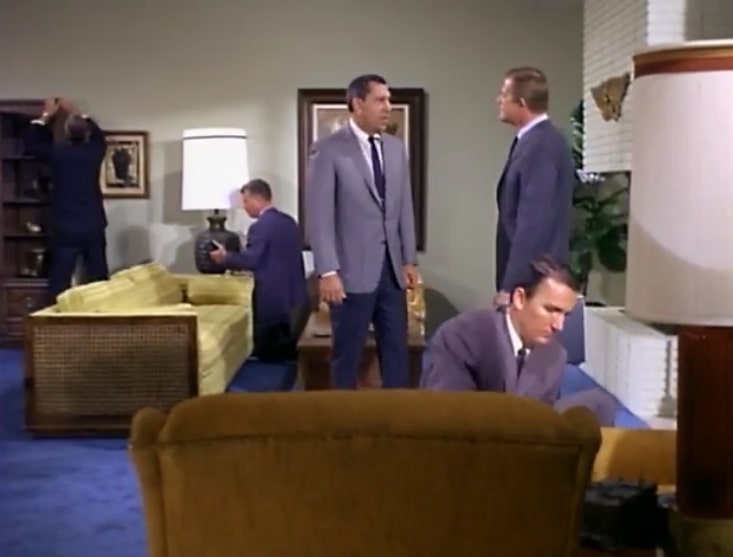 Sgt. Friday and other law enforcement personnel sweep the president's hotel room.