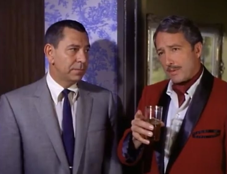 A guy in a smoking jacket refuses to vacate his hotel room. Sgt. Friday looks on.