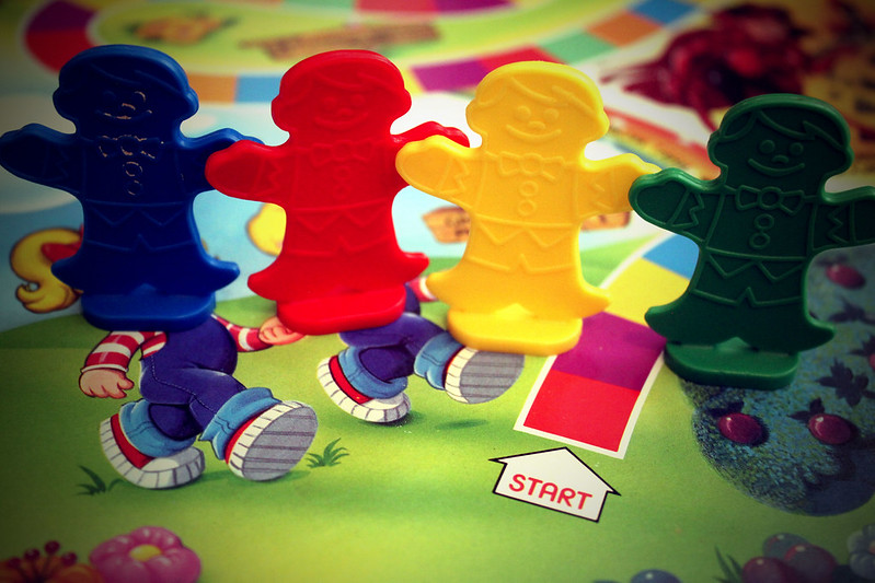 The four Candy Land game pieces in the start position. (Photo by Tiffany Weisberg via Flickr/Creative Commons https://flic.kr/p/dujTtt)
