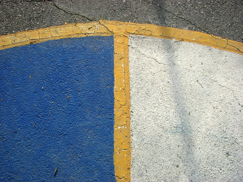 A school playground with blue, white and yellow paint. (Photo by sgrace via Flickr/Creative Commons https://flic.kr/p/9SSXPK)