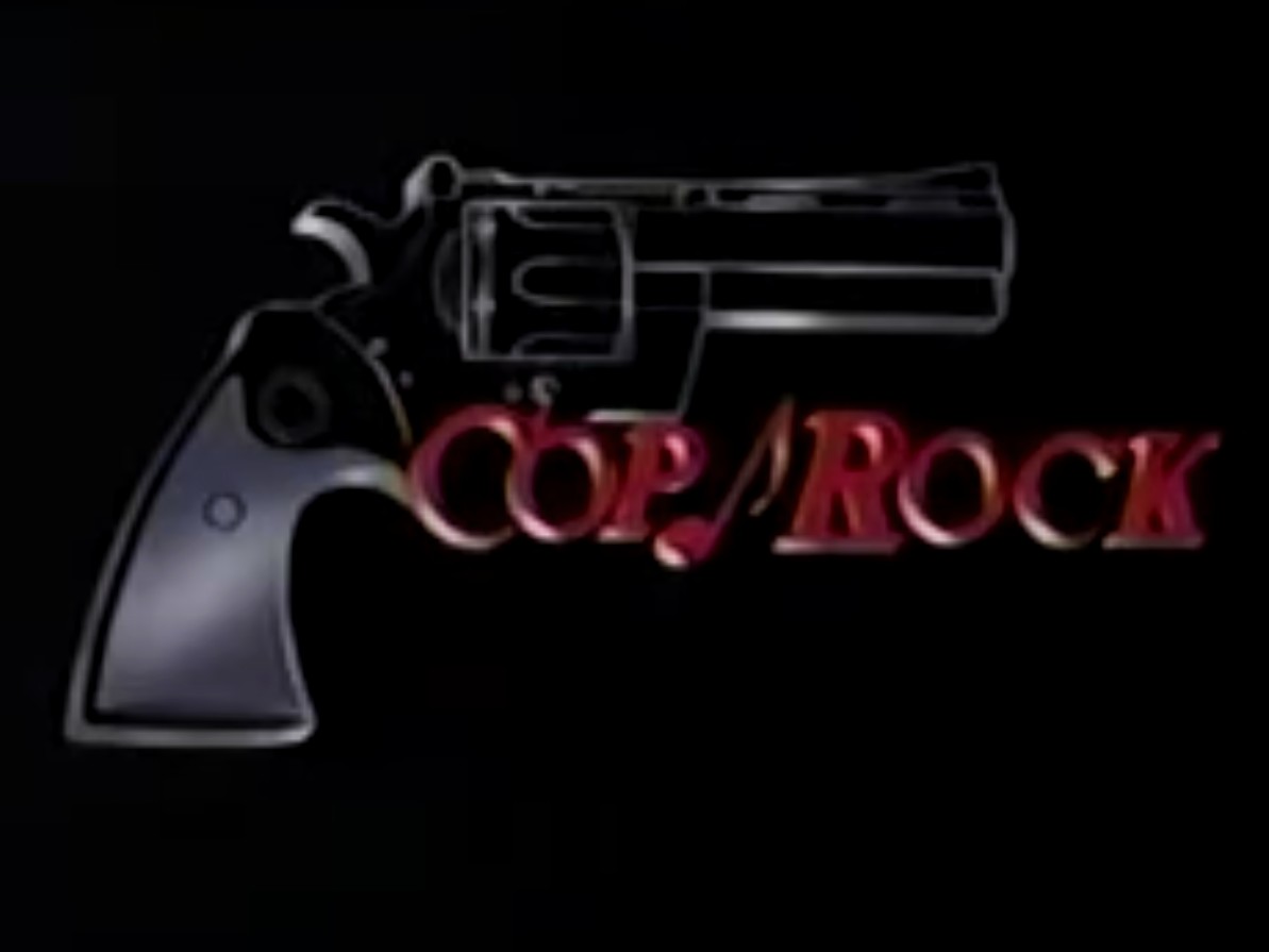 The "Cop Rock" logo is an outline of a police revolver with the words "COP ROCK" written in red underneath. There's also a musical note in between "COP" and "ROCK"