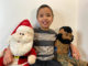 The nearly eight year old with Santa and Mr. T
