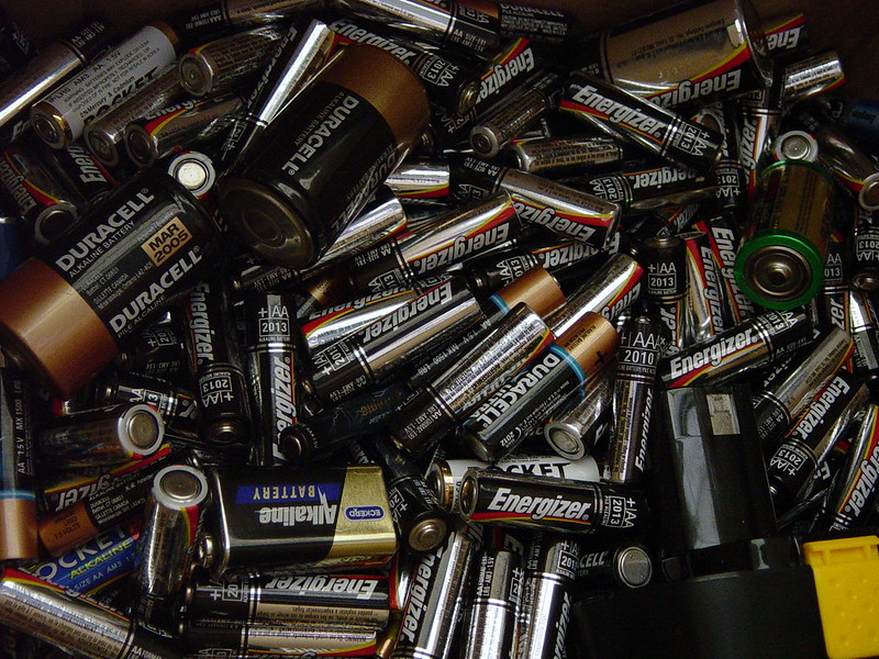 A pile of batteries of various sizes, including AA, AAA, C, D and 9-volt. (Photo by Heather Kennedy via Flickr/Creative Commons https://flic.kr/p/AJFdR)
