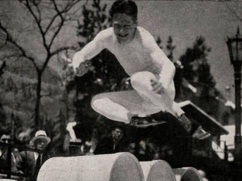 Red McCarthy jumping barrels from a 1950s ad. (Photo via Wikicommons https://en.wikipedia.org/wiki/Barrel_jumping#/media/File:Black_Forest_Village_(NBY_417446).jpg)