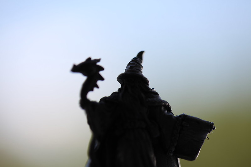 Silhouette of an action figure of a wizard riding a dragon. (Photo by Jared Tarbell via Flickr/Creative Commons https://flic.kr/p/acjx24)