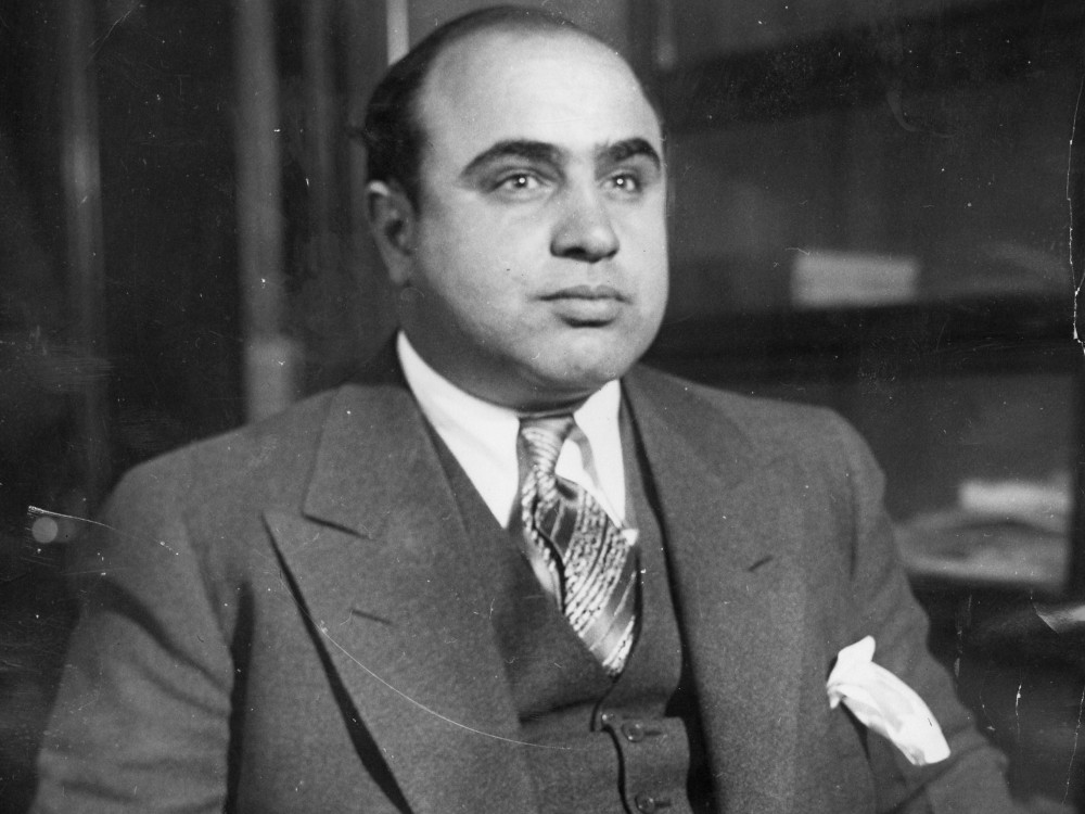 Al Capone arrested around 1930. Photo via Wikicommons https://commons.wikimedia.org/wiki/Category:Al_Capone#/media/File:Al_Capone_in_1930.jpg
