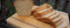A loaf of sliced bread on a wooden cutting board. (Photo by Bart Everson via Flickr/Creative Commons https://flic.kr/p/dErQ3a)