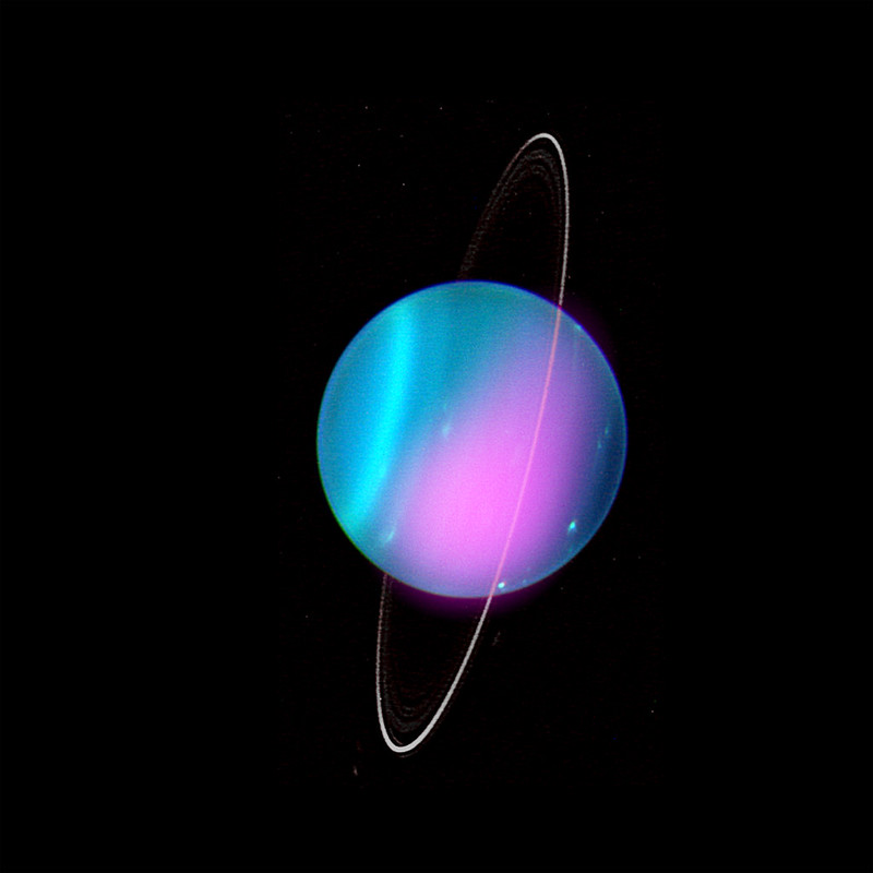 An image of planet Uranus showing rings and moons. Image credit: X-ray: NASA/CXO/University College London/W. Dunn et al; Optical: W.M. Keck Observatory via Flickr/Creative Commons https://flic.kr/p/2kQGBZr