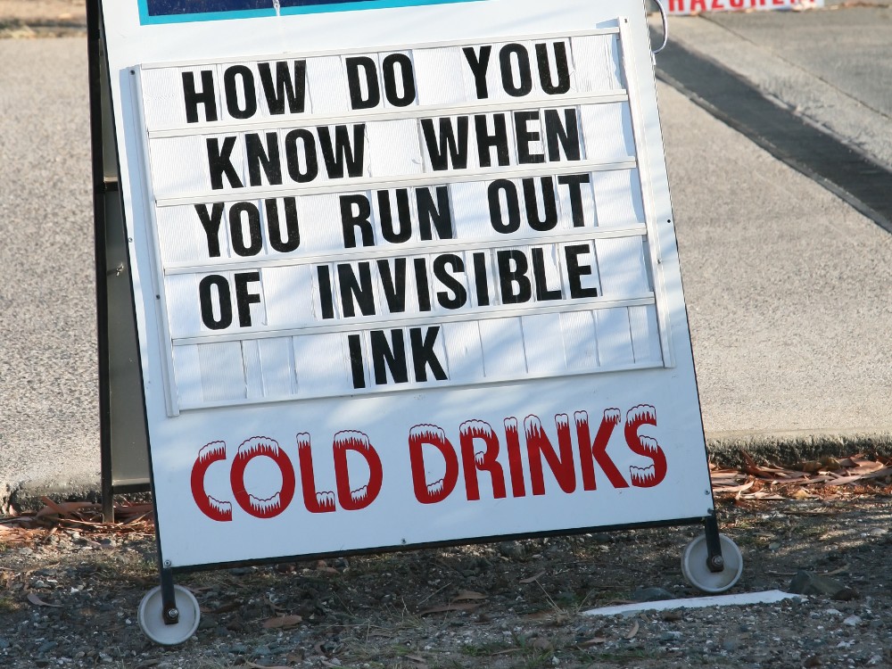 A store sign says "how do you know when you run out of invisible ink" (Photo by bnertknot via Flickr/Creative Commons https://flic.kr/p/dvMdEf)