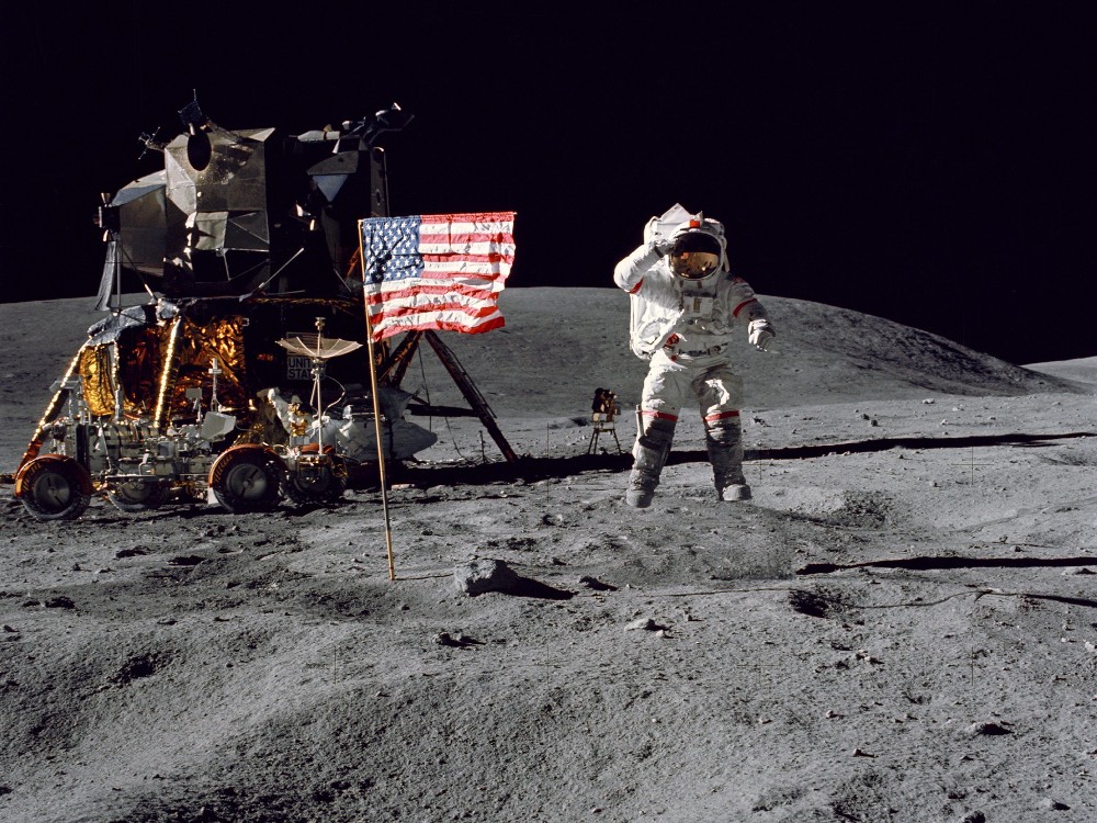 Apollo 16 commander John W. Young salutes the United States flag during the mission’s first extravehicular activity. Photo by Charles M. Duke, NASA, via Flickr https://flic.kr/p/nbc4UP