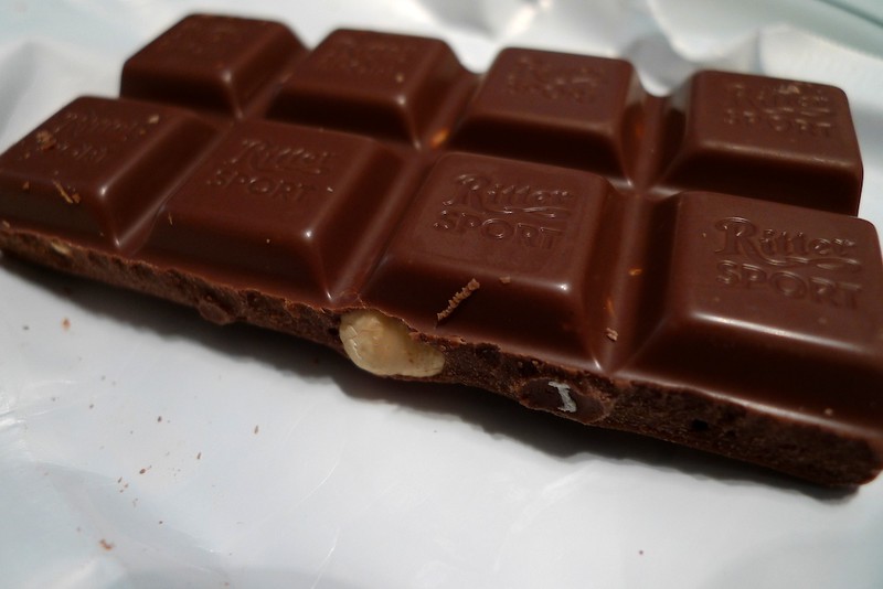 Close-up of a Ritter Sport chocolate bar with hazelnut. (Photo by The Marmot via Flickr/Creative Commons https://flic.kr/p/8jZm55)