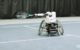 ESTHER the wheelchair tennis playing robot hits a ball. Screenshot via Georgia Tech University https://www.cc.gatech.edu/news/tennis-robot-could-pave-way-advancement-fast-movement-robotics