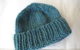 Blue knitted newborn hat. (Photo by ~Kristie via Flickr/Creative Commons https://flic.kr/p/6k7xi6)