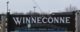 The welcome sign in Winneconne WI reads "Welcome to Winneconne - History's Crossing Place..." (Photo by Royalbroil - Own work, CC BY-SA 3.0, via Wikicommons https://commons.wikimedia.org/w/index.php?curid=9891375)
