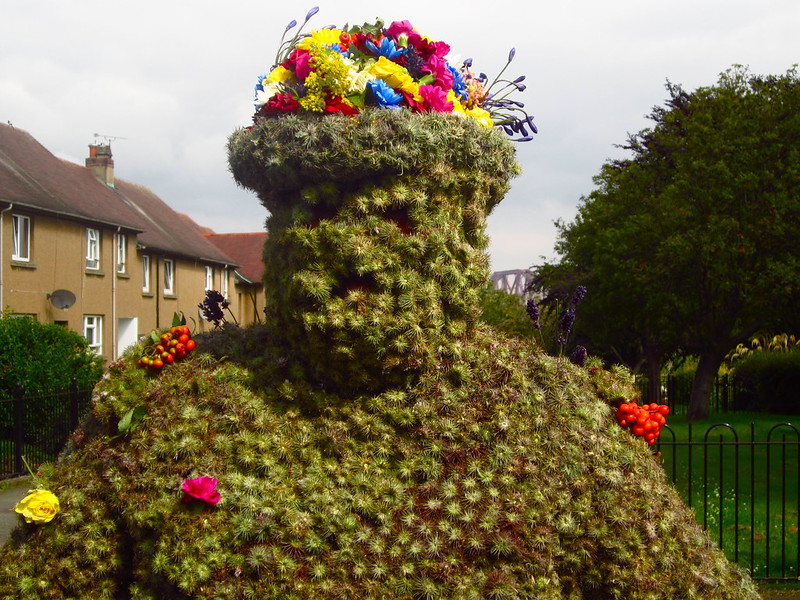 Close-up of the Burryman in his suit of burrs. (Photo by angus mcdiarmid via Flickr/Creative Commons https://flic.kr/p/cP8gQC)