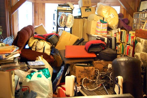Most of our stuff crammed into a back room of the house during renovation.