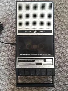 a silver and black General Electric cassette recorder