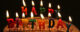 A birthday cake with candles that spell out "Happy Birthday." (Photo by JLK_254 via Flickr/Creative Commons https://flic.kr/p/bCDJSs)