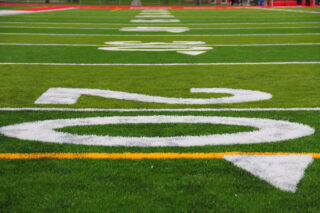 The 20 yard line of a football field. (Photo by Daniel X. O'Neil via Flickr/Creative Commons https://flic.kr/p/9B5uXo)