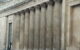 Stone pillars are part of the exterior of the Bank of England in London. (Photo by James Stringer via Flickr/Creative Commons https://flic.kr/p/5wN4sn)