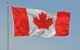 A Canadian flag flying on a pole. (Photo by Robert Pruner via Flickr/Creative Commons https://flic.kr/p/gbXyxk)