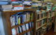 A series of bookshelves, covered in books. (Photo by Joanna Penn via Flickr/Creative Commons https://flic.kr/p/6CjRAr)