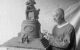 Sculptor USJ Dunbar with a scale version of a proposed "Mammy memorial" for Washington DC, 1923. (National Photo Company Collection - Library of Congress, via Wikicommons https://en.wikipedia.org/wiki/Mammy_memorial#/media/File:U.S.J._Dunbar,_6-27-23_LCCN2016847717.jpg)