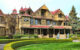 The exterior of the Winchester Mystery House in San Jose, CA. (Photo by Bryan Hughes via Flickr/Creative Commons https://flic.kr/p/bDf86M)