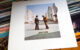 An LP edition of Pink Floyd's Wish You Were Here album, featuring the cover of the two men in suits shaking hands while one is on fire. Photo by Trixi Skywalker via Flickr/Creative Commons https://flic.kr/p/muRD7d