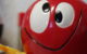 A red toy octopus with wild, googly eyes and a silly smile. Photo by Rafa Otero via Flickr/Creative Commons https://flic.kr/p/4FAgny